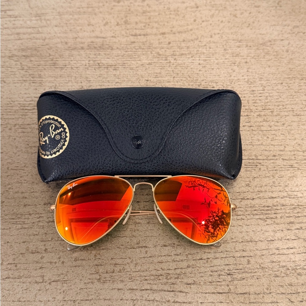 Ray-Ban Gold Frame Sunglasses with Vibrant Red Lenses